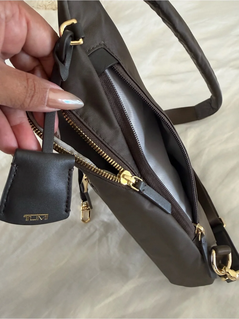 Tumi compact sling